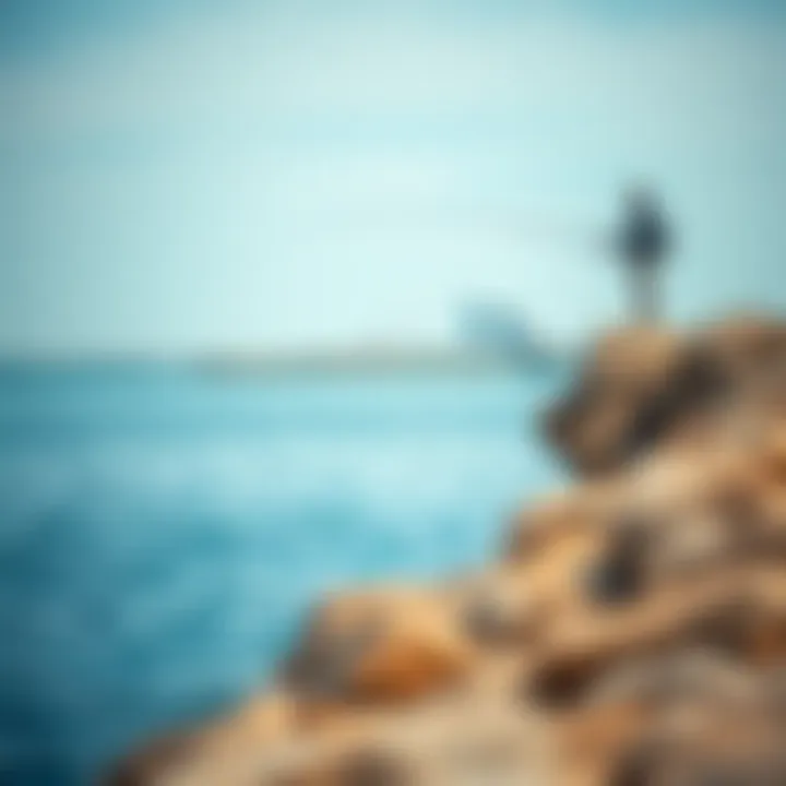 Fisherman at Jumeirah Fishing Spot A serene fishing scene with a fisherman casting a line from a rocky outcrop, illustrating the peacefulness of the area.